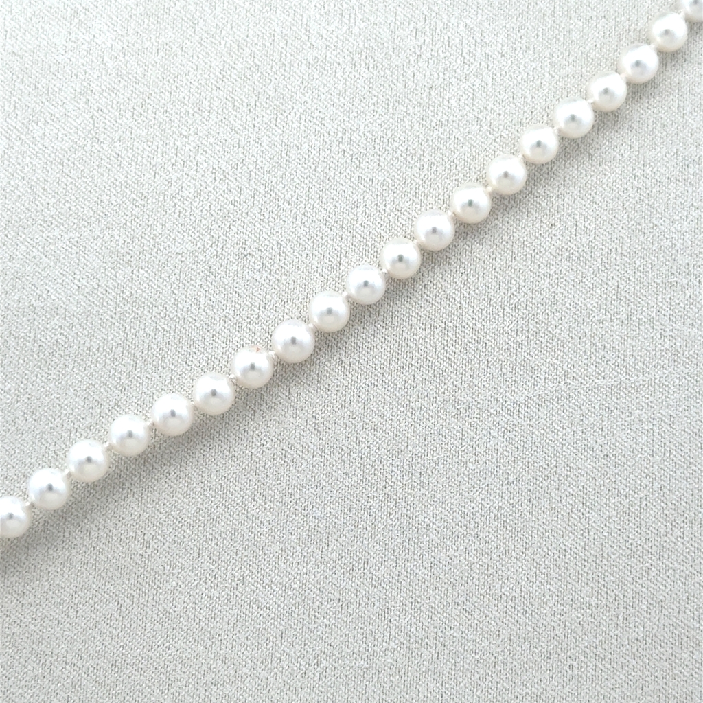 Bracelet or 2 tons (jaune et blanc) 14 carats, perles de culture AA 5-5.5 millimètres