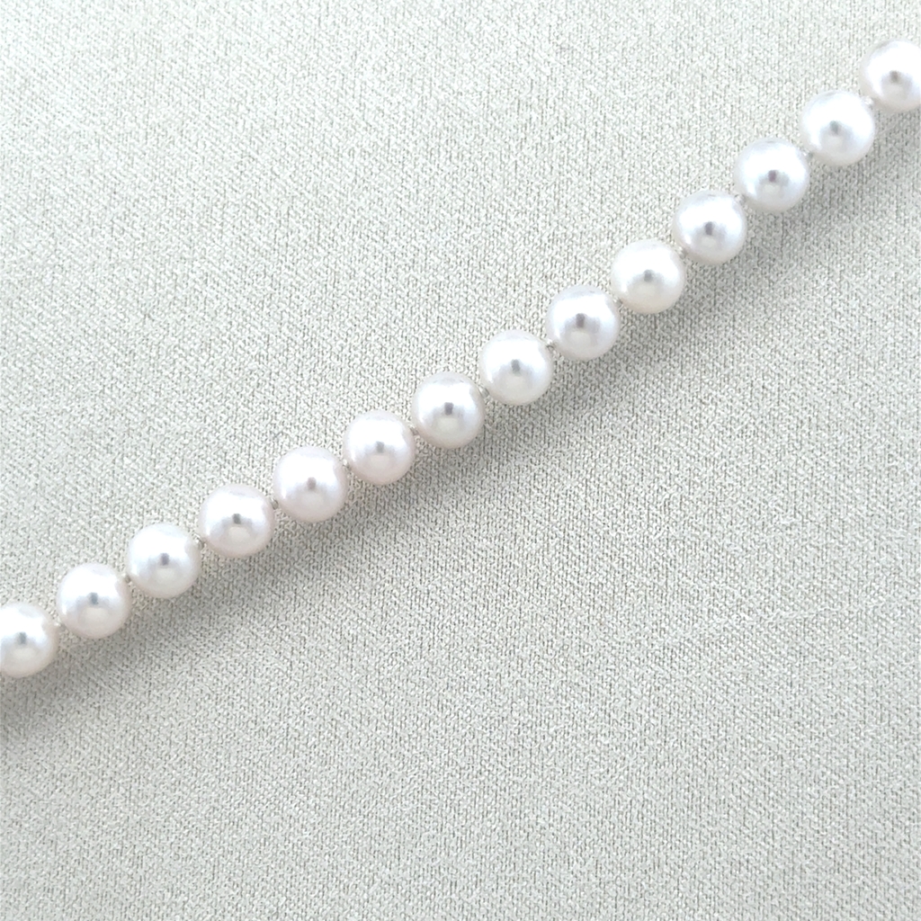 Bracelet or 2 tons (jaune et blanc) 14 carats, perles de culture AA