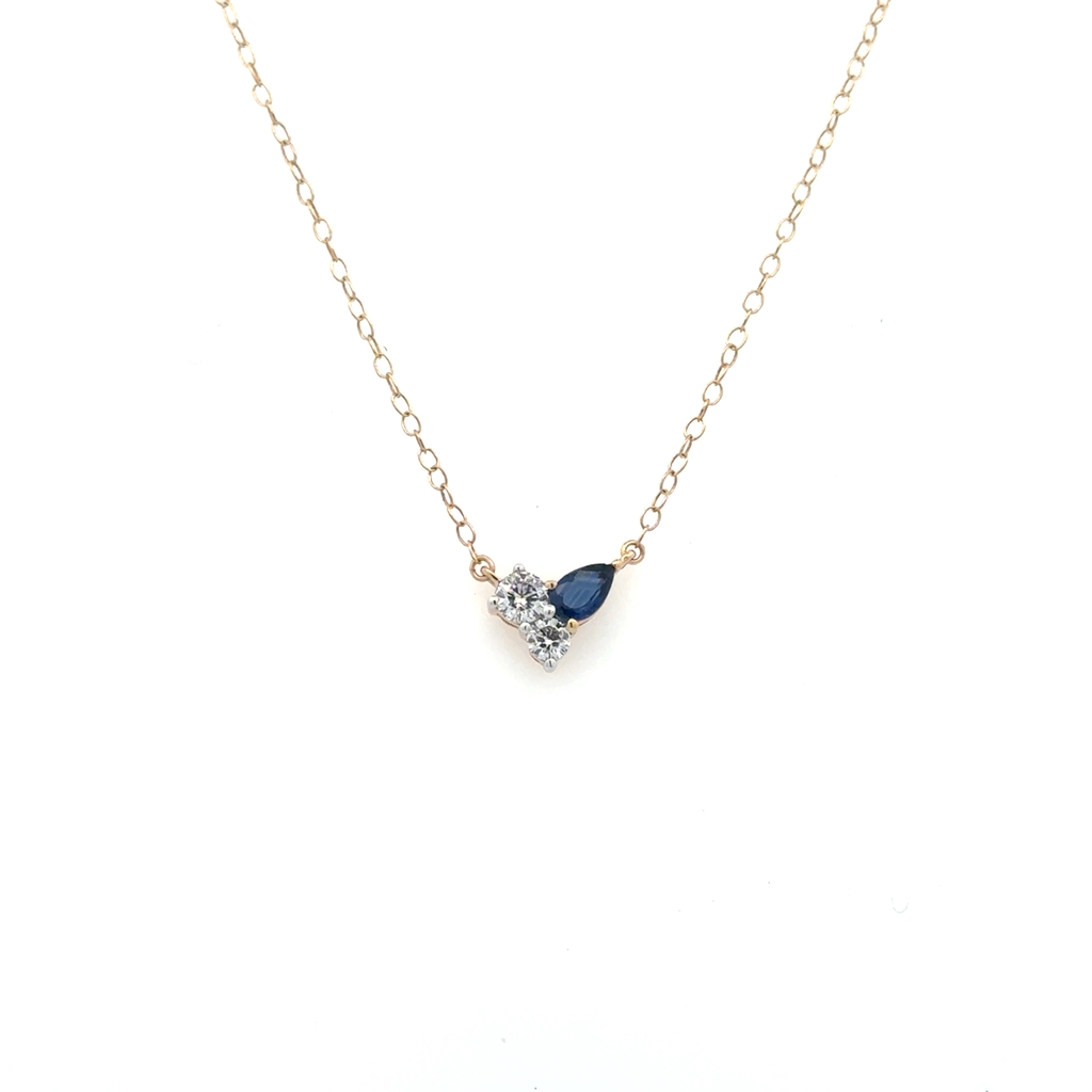 Yellow gold 14k pendant with 25 total diamond points, sapphire
